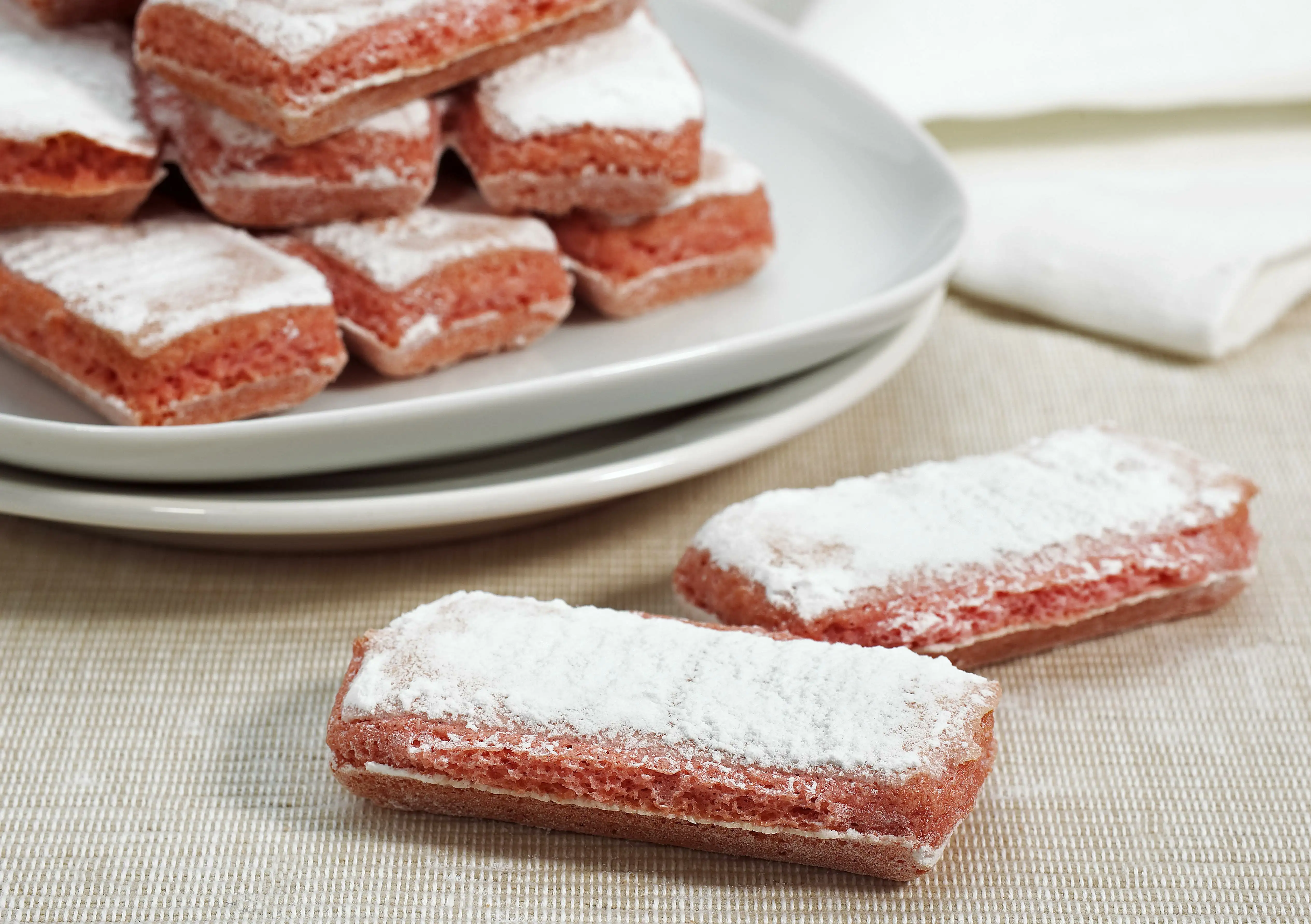 ink biscuit cakes topped with icing sugar