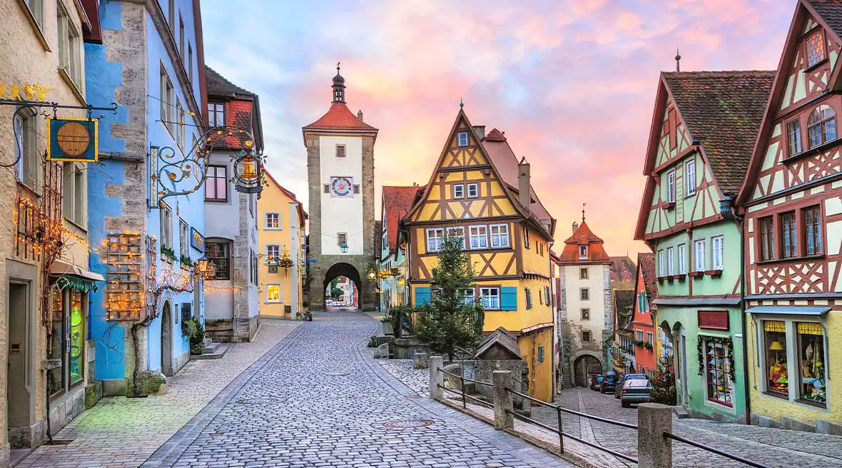 Colourful medieval houses and two cobbled lanes in an old town