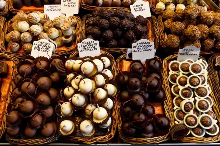 Baskets full of Belgian chocolates in a shop