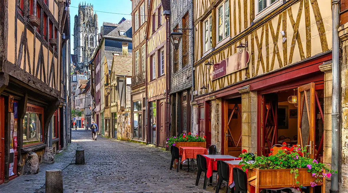 Half-timbered houses, restaurants, shops and cafés of a historic street in an old town