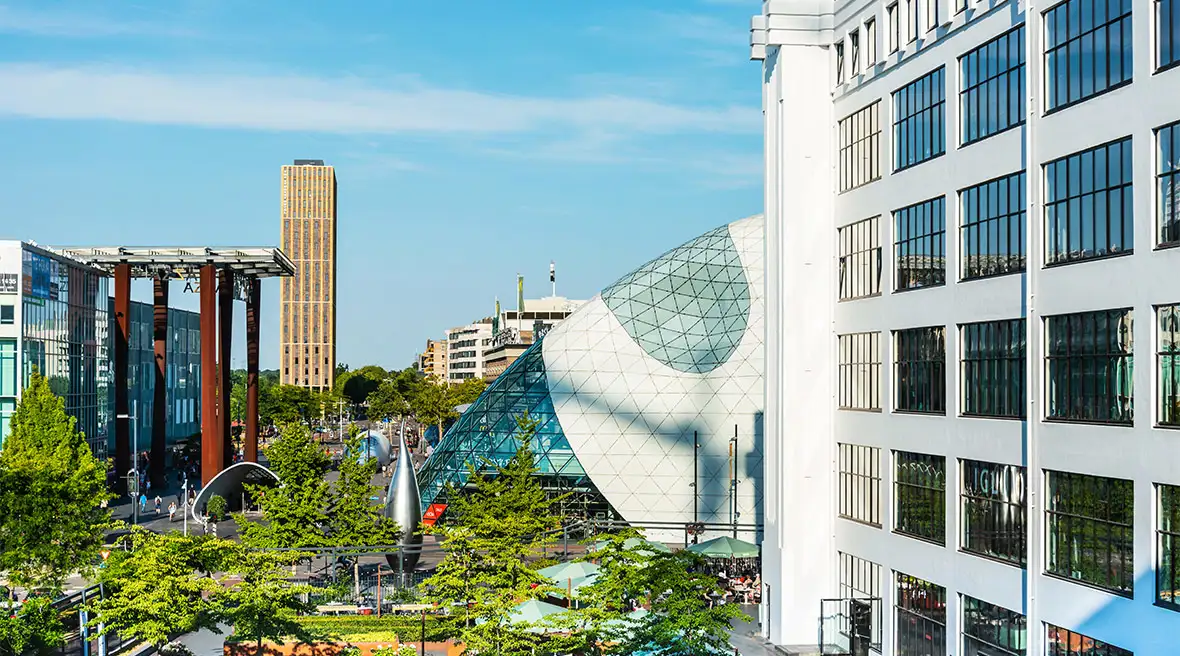 Various modern buildings in a city square, Eindhoven