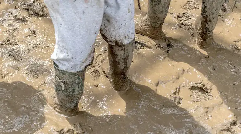Muddy boots Glastonbury